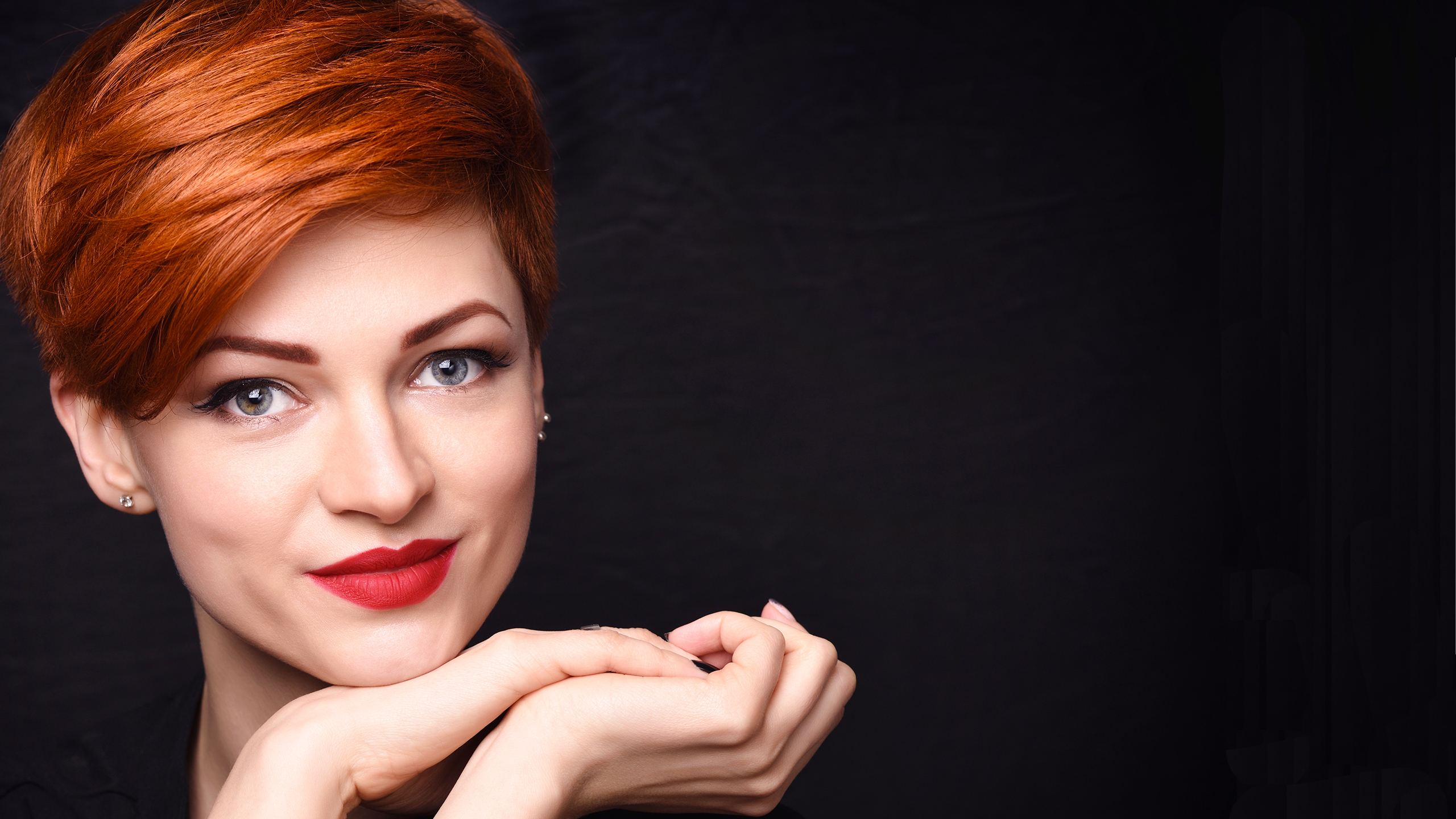 Woman with short red hair